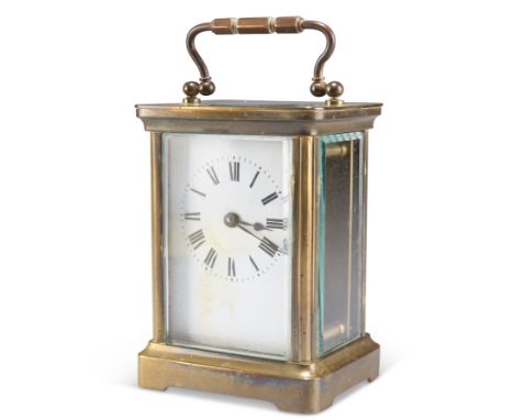 A FRENCH BRASS CASED CARRIAGE CLOCK, BY DUVERDRY &amp; BLOQUEL, CIRCA 1910, the white enamel dial with Roman numerals. 11cm h
