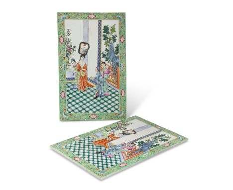 A LARGE PAIR OF CHINESE PORCELAIN PLAQUES, rectangular, enamel painted with figures in an interior, the green border painted 