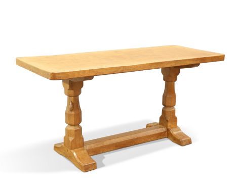 ROBERT THOMPSON OF KILBURN, A MOUSEMAN OAK COFFEE TABLE, CIRCA 1970, the adzed rectangular top raised on a refectory base, wi