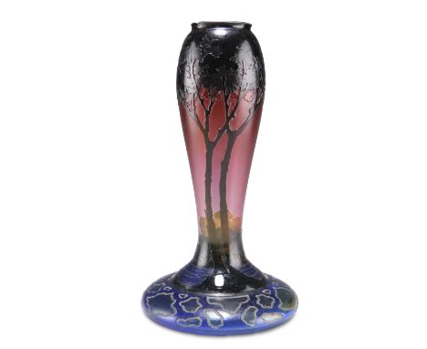 AN ART NOUVEAU CAMEO GLASS LAMP BASE, probably French, decorated with trees in a landscape. 22.5cm high (a/f)CONDITION REPORT