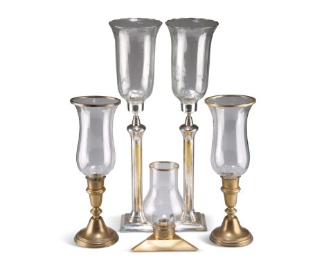 TWO PAIRS OF HURRICANE LAMPS, the taller pair with chromed brass bases, the short pair with brass bases; together with ANOTHE