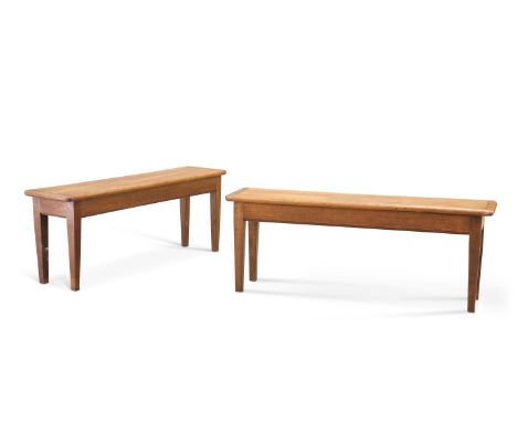 A PAIR OF EARLY 20TH CENTURY OAK BENCHES,&nbsp;with square-section tapering legs. (2) 118cm longCONDITION REPORTHeight 45cm, 