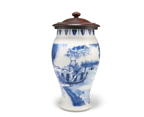 A CHINESE TRANSITIONAL STYLE BLUE AND WHITE VASE, of baluster form,&nbsp;the baluster body painted with a figure in a boat pl