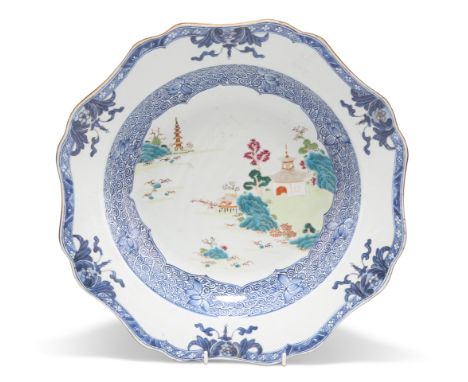 AN 18TH CENTURY CHINESE FAMILLE ROSE BASIN, shaped circular, painted with a landscape and further decorated in underglaze blu