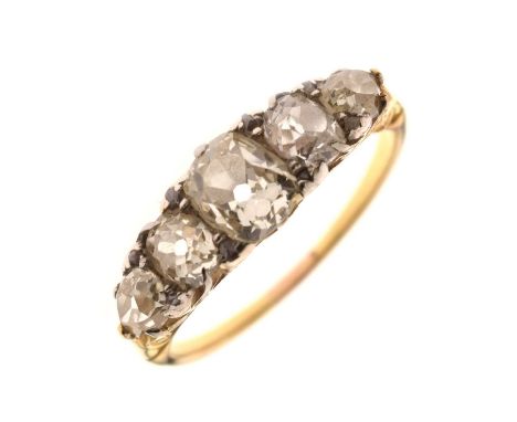 Diamond five stone yellow metal ring, five old cushion cut and old pear cut diamonds, the central old cushion cut diamond mea