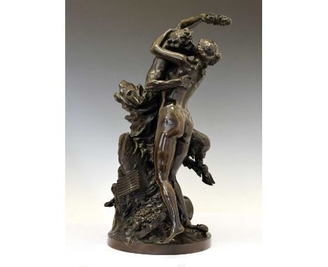 After Claude-Michel Clodion (1738-1814), patinated bronze Bacchanalian group, modelled as a nymph with adult and infant satyr
