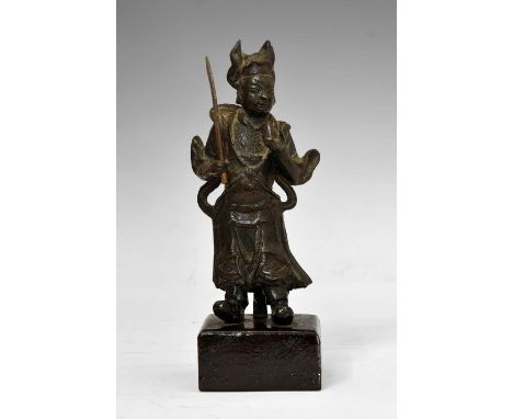 Chinese patinated bronze figure of a warrior or official, late Ming or early Qing dynasty (circa 17th or early 18th century),