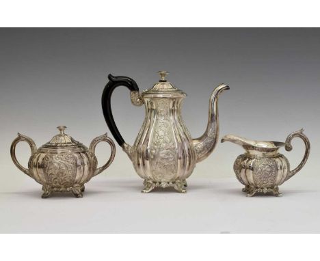 Mid 20th century Indian white-metal three-piece coffee set comprising coffee pot, lidded two-handled sucrier, and milk jug, e