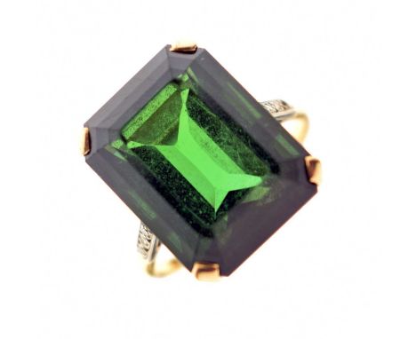 Green tourmaline and diamond 18ct yellow gold and platinum set ring, the truncated corner rectangular step cut tourmaline mea