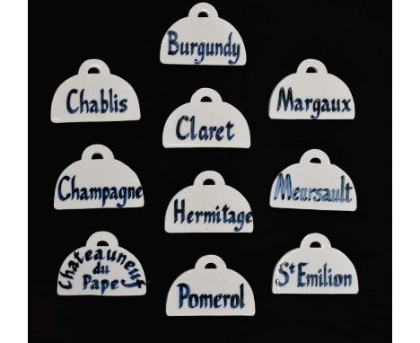 Set of ten 20th century ceramic wine bin labels each with blue lettering on a white ground; 'Burgundy', 'Chablis', 'Champagne