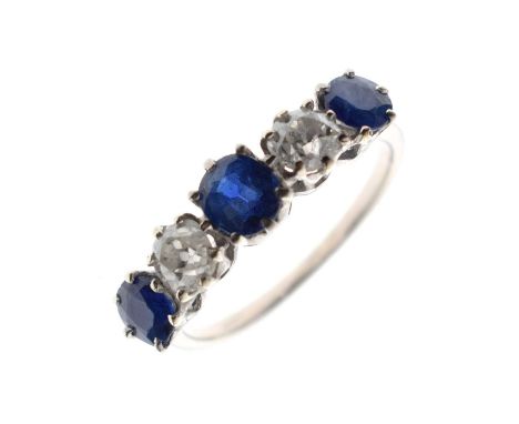 Sapphire and diamond five stone white metal ring, the central sapphire measuring approx. 5.15mm x 4.62mm x 2.76mm, the two ro