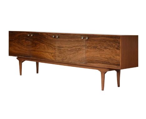 Maple & Co - 1960s teak and rosewood-veneered sideboard, having a pair of drop-front central doors, each enclosing a shelf, f