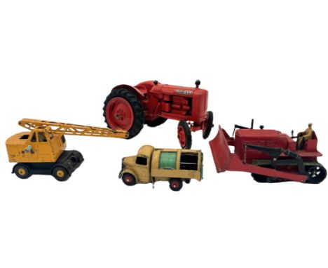 A collection of vintage toy vehicles, to include a metal Nuffield tractor model, 11 cm, also Dinky Blaw Know bulldozer, Coles