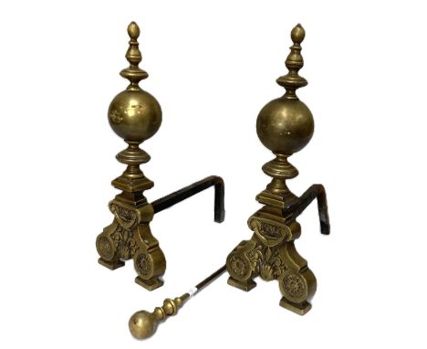 A pair of 18th century style brass and iron andirons, 20th century,   with knop finials, also includes a poker (3) 50cm high