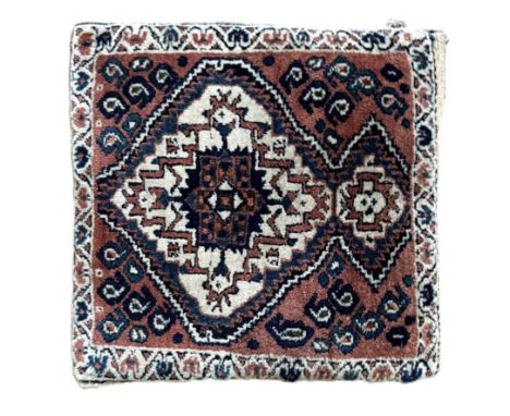 Four assorted vintage rugs and a cushion, including a small Turkish Kilim rug, on light red ground, 98cm x 53cm; another simi
