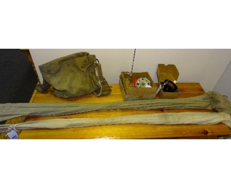 A vintage three piece split cane fishing rod, approx 9ft long, in canvas carry bag, also with a two piece split cane fishing 