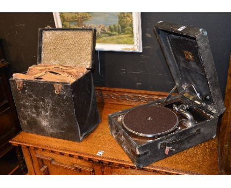 A vintage HMV portable gramophone, also with a box of vinyl records (a lot)   CONDITION REPORT:  Lot 232 - winder is very tig