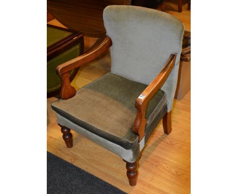 A Victorian mahogany framed open armchair, upholstered in later vintage period green velour, 73cm high