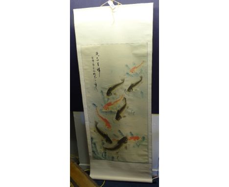 A Chinese scroll watercolour on rice paper, decorated with carp, character marks to top, 130 x 65cm