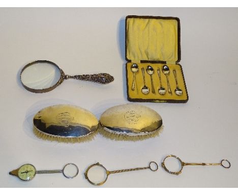 A cased set of six silver coffee spoons, hallmarks for Birmingham 1925 WD, of plain design, in fitted leather case, together 