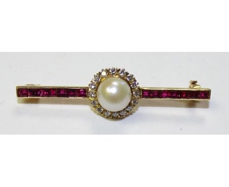 An 18ct gold pearl, diamond and ruby bar brooch, the large central pearl surrounded by circle of brilliant cut diamonds, meas