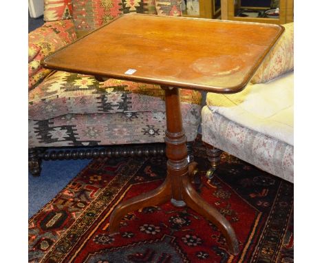 A 19th century mahogany snap top tea table, raised on turned column and tripod supports, 70cm high x 55cm wide