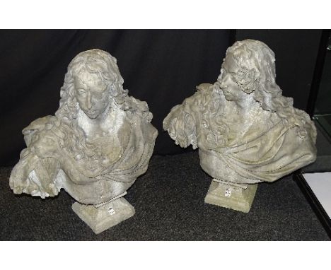 A near pair of garden statuary busts of classical females, one wearing an eye patch, with grotesque lion mask decoration, rai