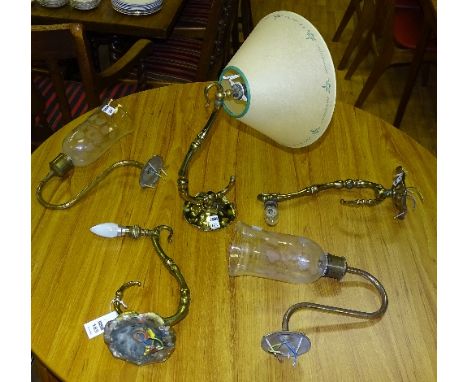 Three matching late Victorian gilt metal wall lights, raised on hammered circular base, 37cm long, also with a pair of vintag