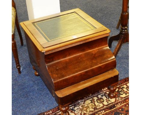 A Victorian and later converted mahogany commode stool, with hinged top above bombe style front and pull out base, with later