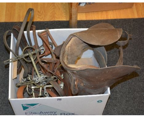 A small quantity of vintage leather horses tack, to include bridles, bits and racing saddle (a lot)