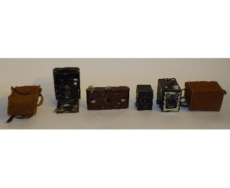 Four vintage cameras, comprising of Ensign Simplex Auto folding camera, Kodak Baby Hawkeye, Kodak no 2 Hawkette folding camer