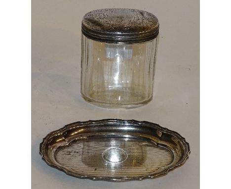 A silver pin tray, hallmarks for Birmingham 1915, Walker & Hall, with engine turned decoration and circular plain cartouche t