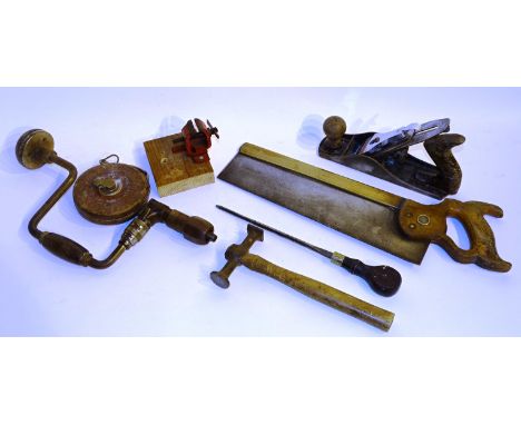 A collection of vintage tools, to include saws by Disston-Canada, plains, hammer, tape measures set squares etc (a lot)