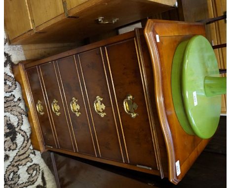 A reproduction Georgian style cross banded yew wood finished side cupboard, the single cabinet door simulating five faux draw