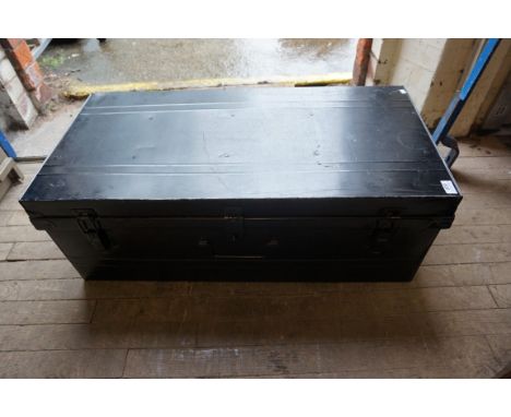 A Vintage ebonised tin trunk, with twin carrying handles.