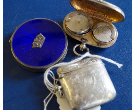 A silver and blue enamel compact, the lid with an applied crown to the centre, together with, a silver vesta case, initialled