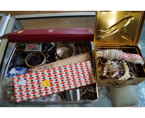 A collection of costume jewellery, to include; two bangles, mother of pearl belt buckle, Lotus pearls, brooches, and other it