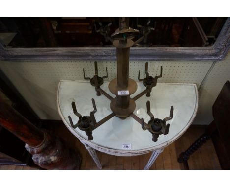 A brass period style four branch chandelier, a Comitti of London reproduction period style mahogany cased wheel barometer/the