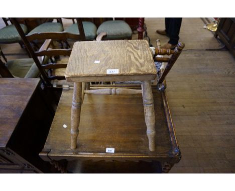 A Vintage rustic farmhouse stool, on four turned supports united by turned H-stretcher.