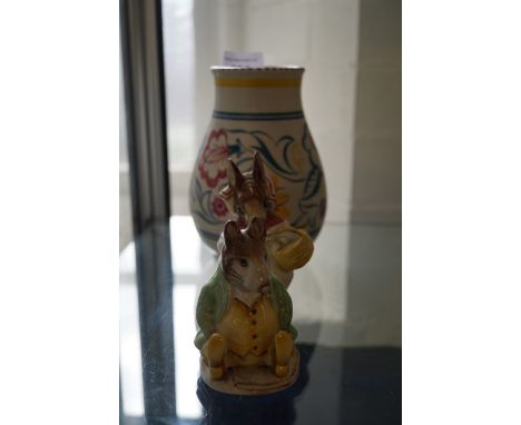 A mixed collection of ceramic items to include Poole pottery baluster form vase and two Beatrix Potter ceramic models of 'Mrs