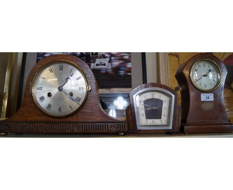 An Edwardian inlaid and transfer printed mahogany mantel clock, English movement, an English 1930s oak cased Art Deco mantel 