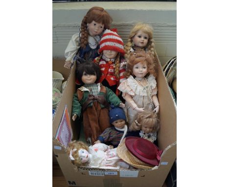Eight various modern ceramic dolls, all fully dressed in varying costumes, some with certificates.
