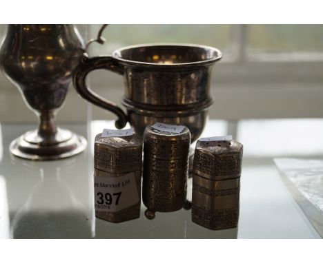 A Sheffield hallmarked silver christening mug, by Walker & Hall of Sheffield, together with an Art Deco engine turned hallmar