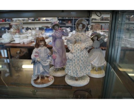 A group of four Royal Worcester lady figurines to include 'The Romantic' and 'The Regency' (4).