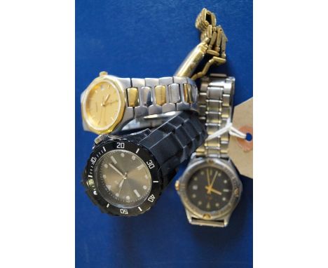 A collection of four Gents wristwatches, to include; A Tissot bicoloured wristwatch, a Limit gold tone bracelet watch, a Lotu