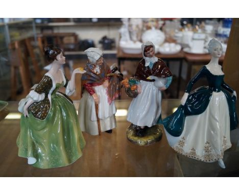 A group of four ceramic lady figurines to include a Royal Doulton model of 'Grandma', 'Regal Lady', 'Country Lass' and 'Fleur