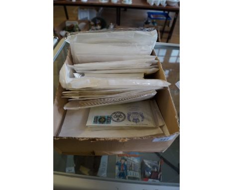 A box containing mainly first day covers, Great British and a few foreign stamps used and unused. 