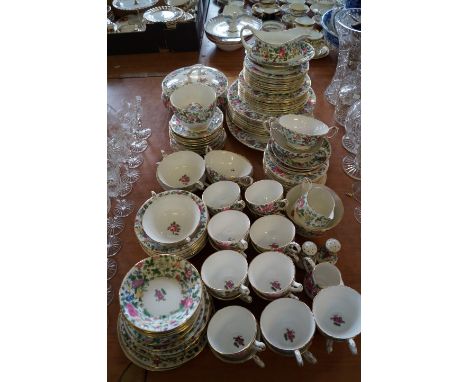An extensive Crown Staffordshire fine bone china tea and dinner service, decorated with bright floral pattern and gilt trimmi