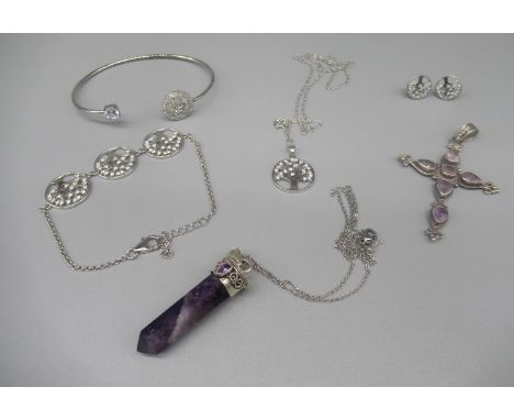 Sterling silver bangle, earrings, bracelet and necklace matching set with tree design set with clear stones, a silver necklac