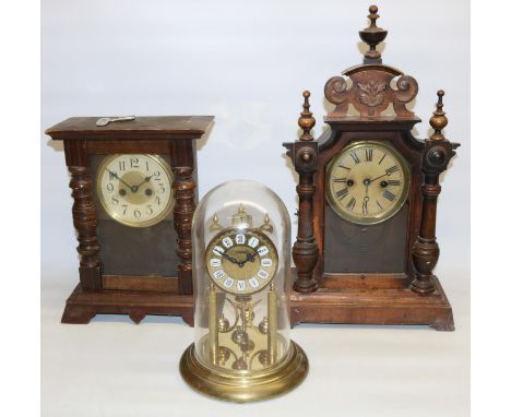 H.A.C. C20th mahogany and stained pine mantle clock, moulded case with full length glazed and carved door with half turned pi